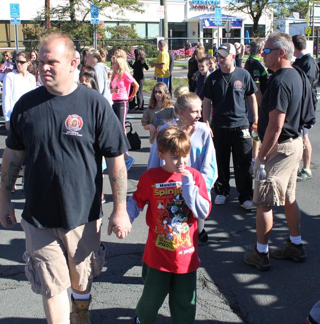 3rd Annual Fire Truck pull for Breast Cancer 9-23-2012. Won by Nanuet  Fire Department in 17.02 seconds,
Photo By Vincent P. Tuzzolino